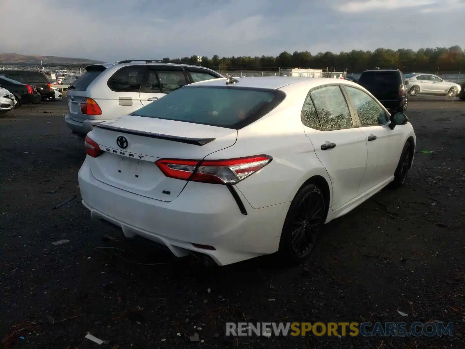 4 Photograph of a damaged car 4T1G11AK0LU302057 TOYOTA CAMRY 2020