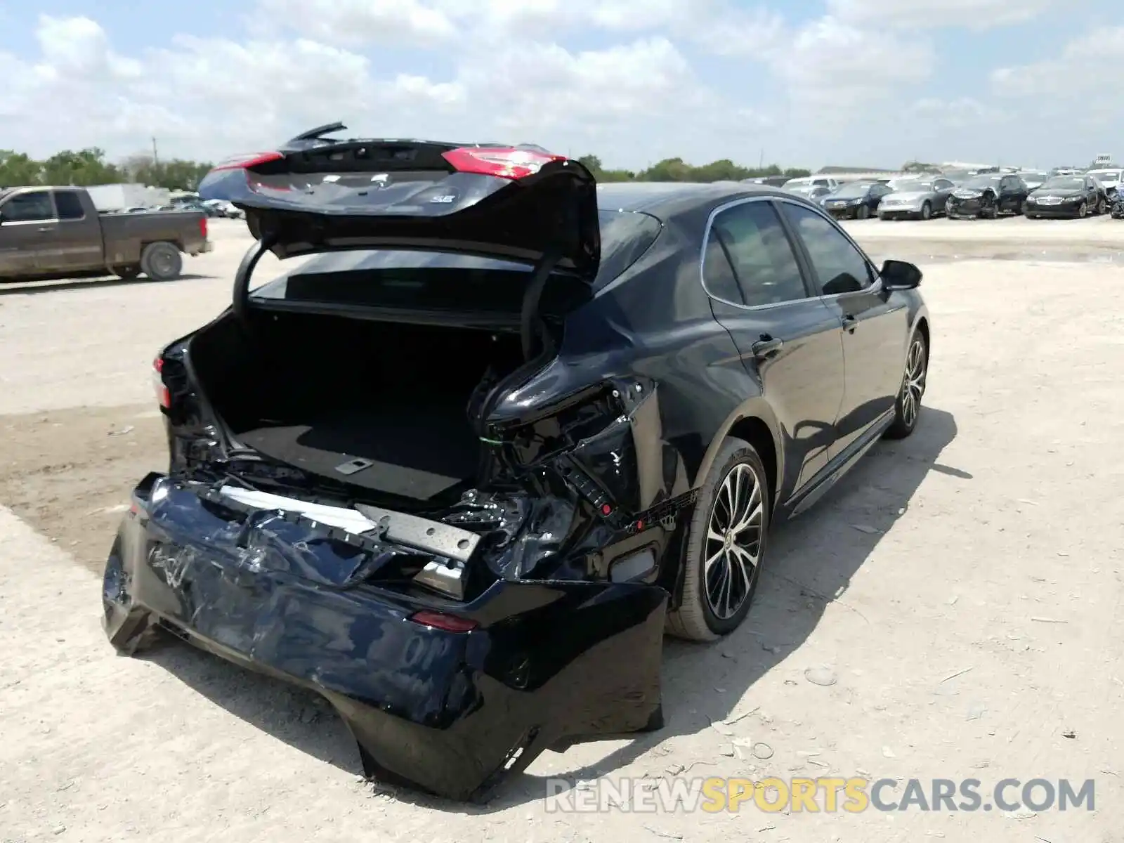 4 Photograph of a damaged car 4T1G11AK0LU974457 TOYOTA CAMRY 2020