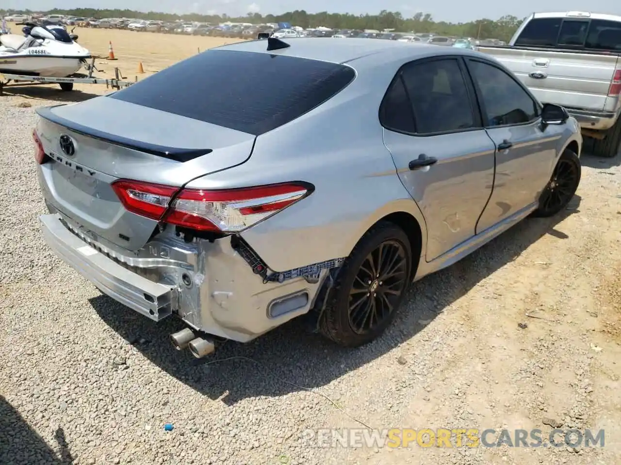 4 Photograph of a damaged car 4T1G11AK1LU389399 TOYOTA CAMRY 2020