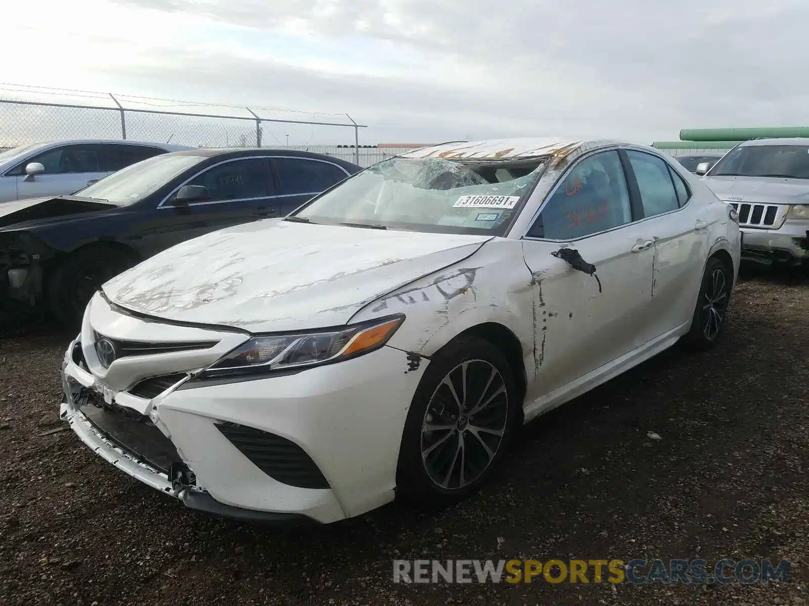 2 Photograph of a damaged car 4T1G11AK1LU393095 TOYOTA CAMRY 2020