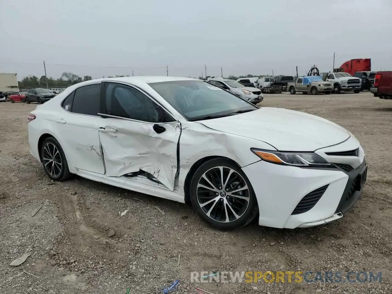 4 Photograph of a damaged car 4T1G11AK1LU880989 TOYOTA CAMRY 2020