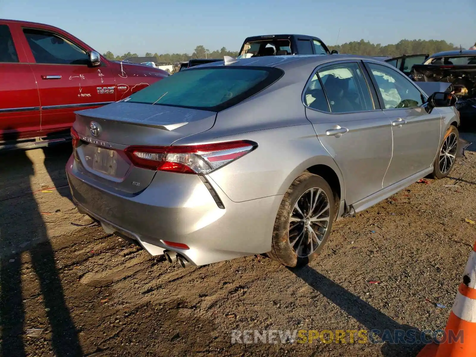 4 Photograph of a damaged car 4T1G11AK1LU891054 TOYOTA CAMRY 2020