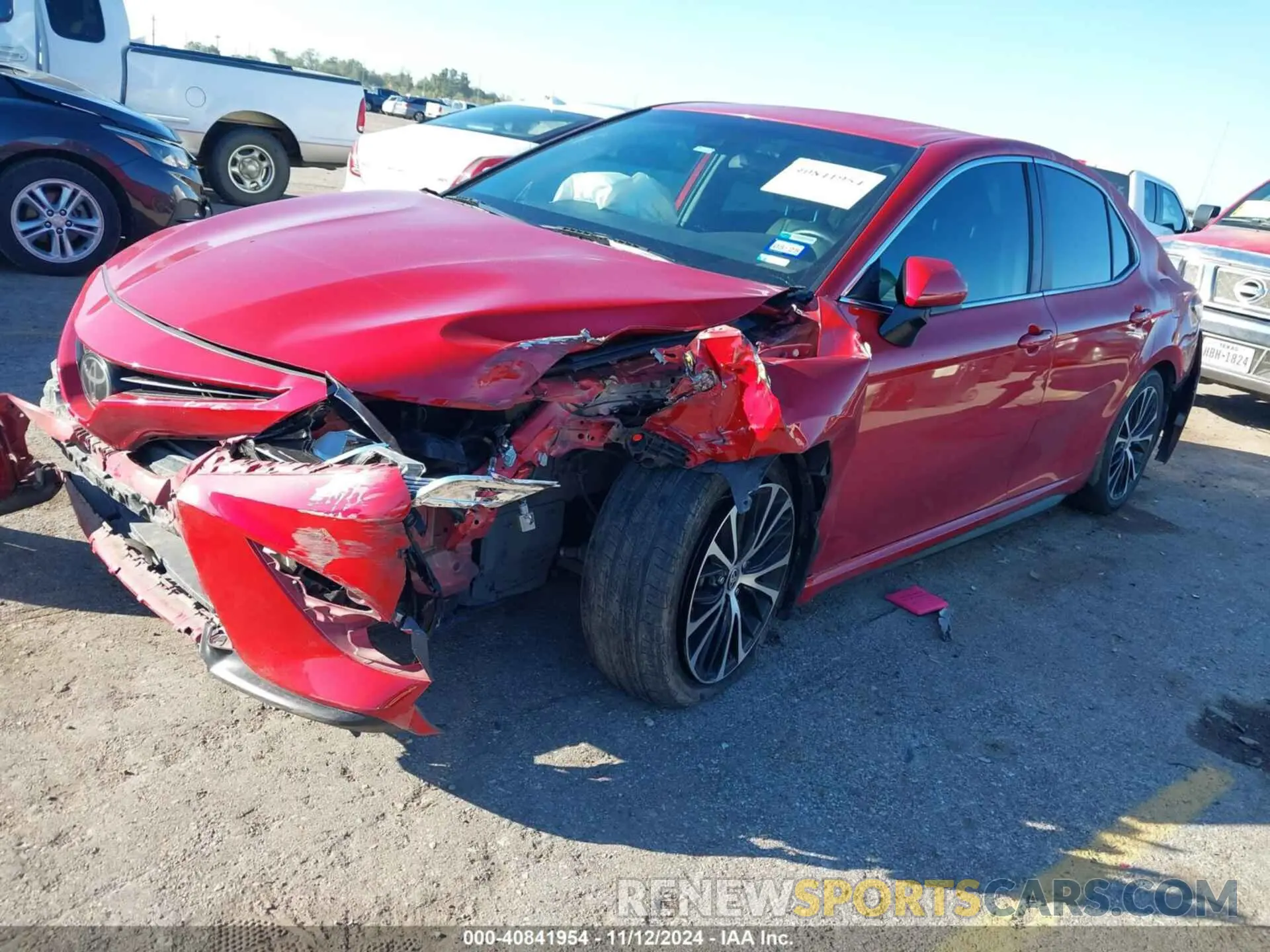 4 Photograph of a damaged car 4T1G11AK2LU386334 TOYOTA CAMRY 2020