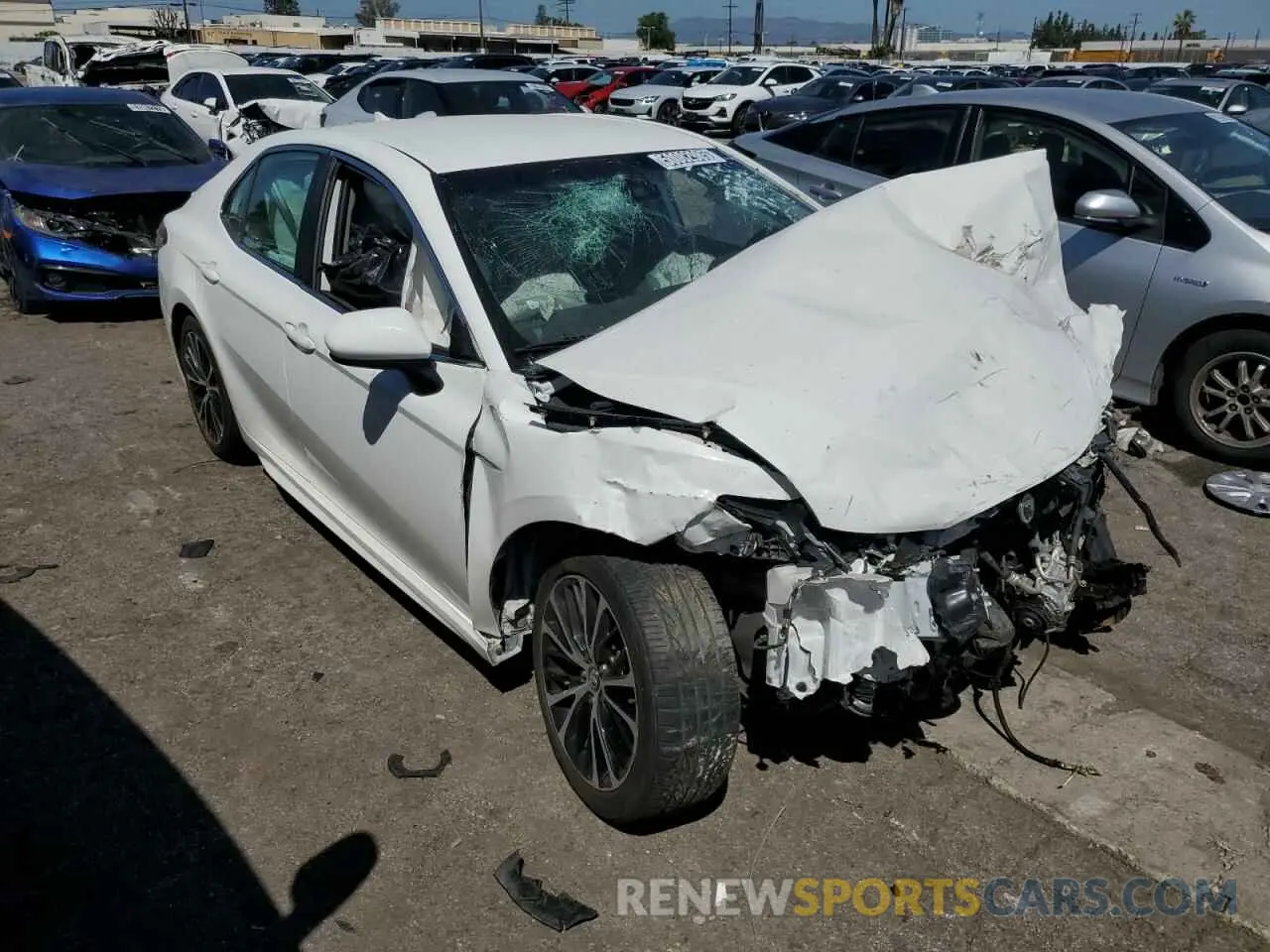 4 Photograph of a damaged car 4T1G11AK2LU942853 TOYOTA CAMRY 2020
