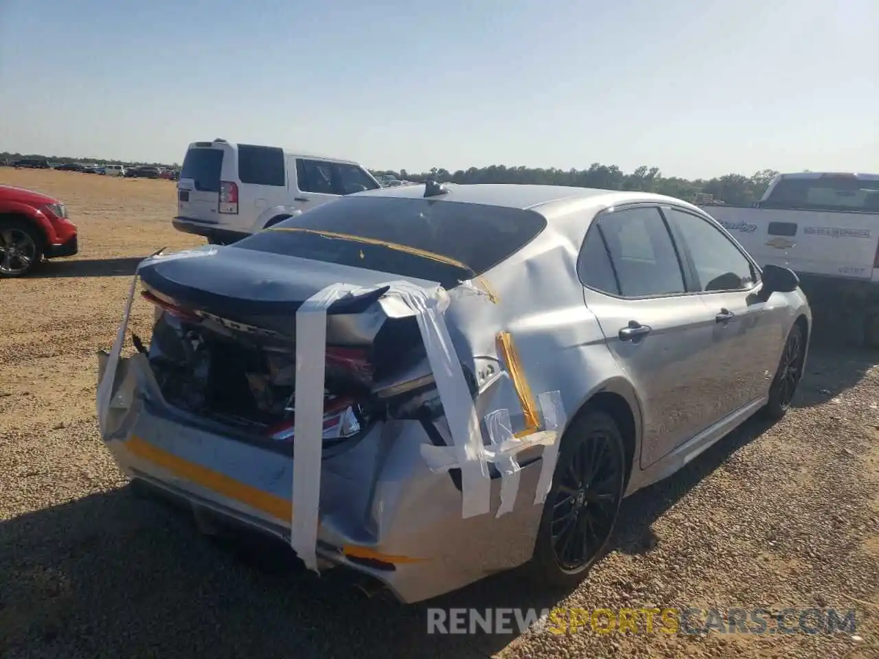 4 Photograph of a damaged car 4T1G11AK3LU302781 TOYOTA CAMRY 2020