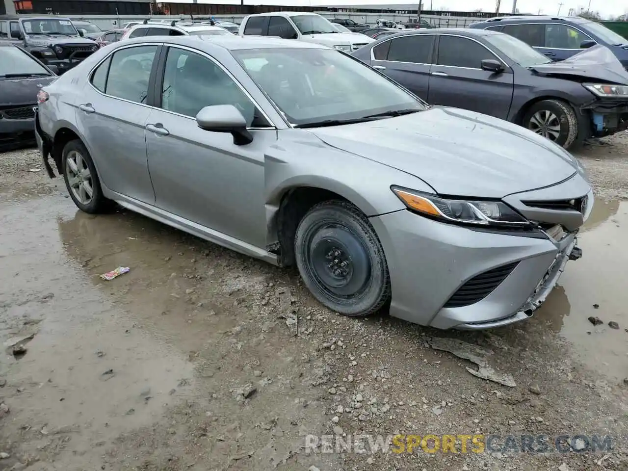 4 Photograph of a damaged car 4T1G11AK3LU380591 TOYOTA CAMRY 2020