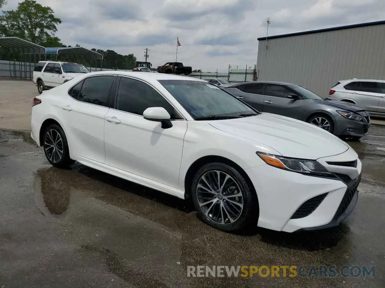 4 Photograph of a damaged car 4T1G11AK3LU506044 TOYOTA CAMRY 2020