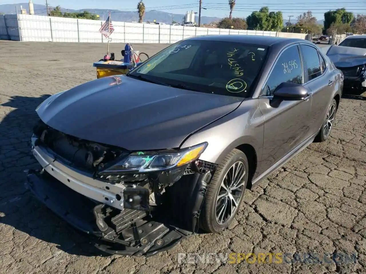 2 Photograph of a damaged car 4T1G11AK3LU868889 TOYOTA CAMRY 2020