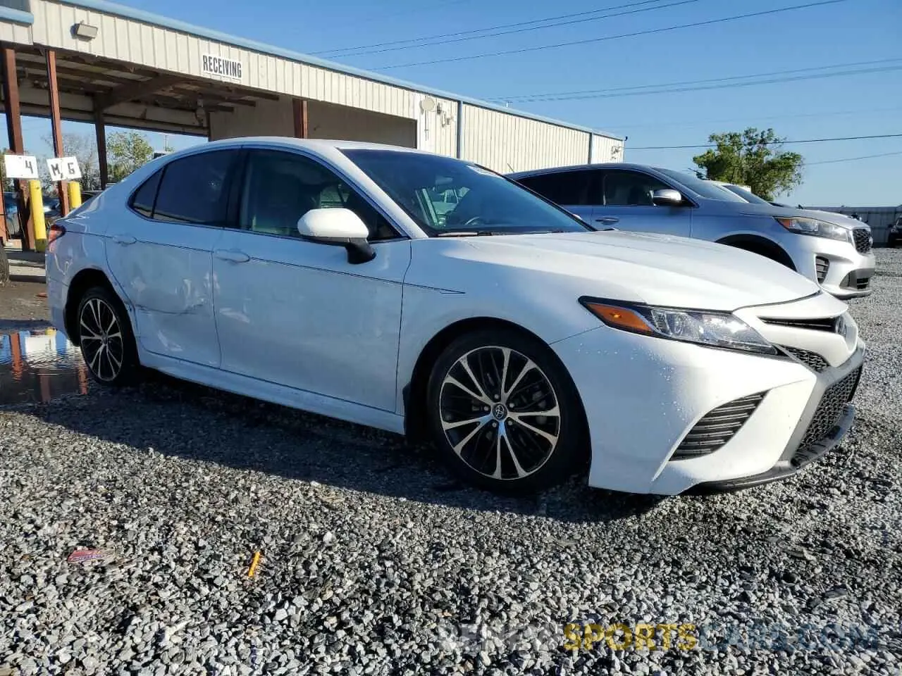 4 Photograph of a damaged car 4T1G11AK3LU890231 TOYOTA CAMRY 2020