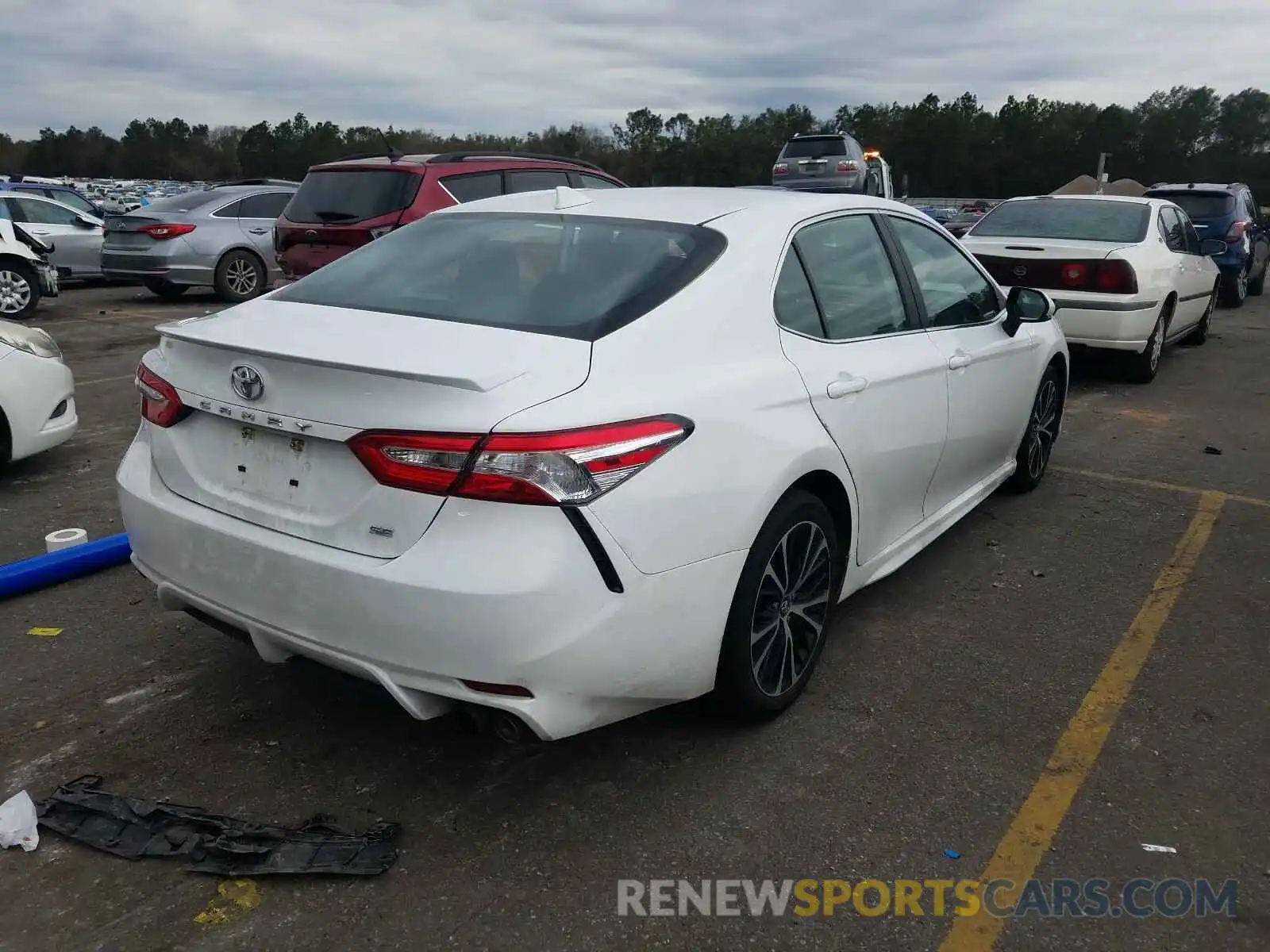 4 Photograph of a damaged car 4T1G11AK3LU914558 TOYOTA CAMRY 2020