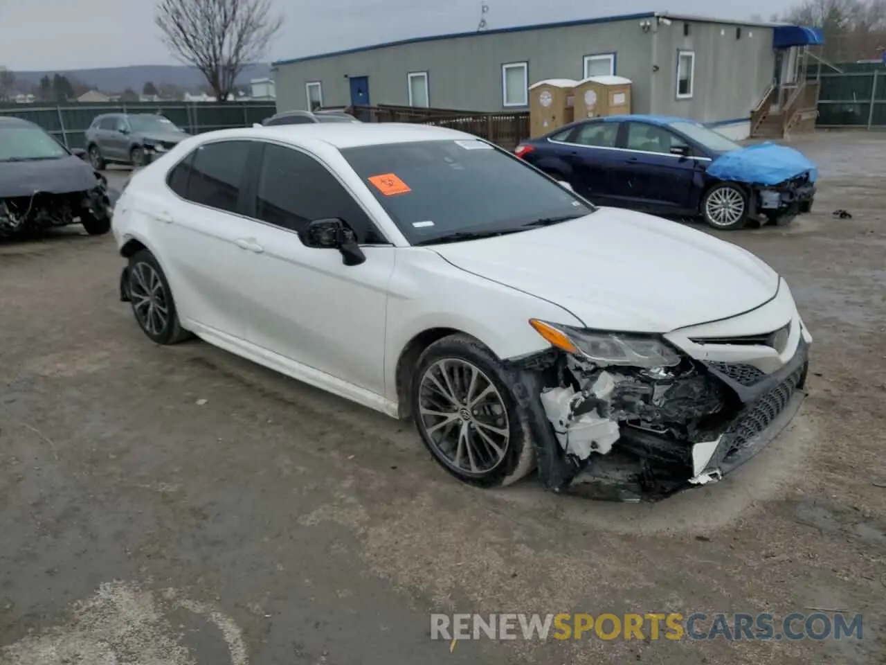 4 Photograph of a damaged car 4T1G11AK3LU946006 TOYOTA CAMRY 2020