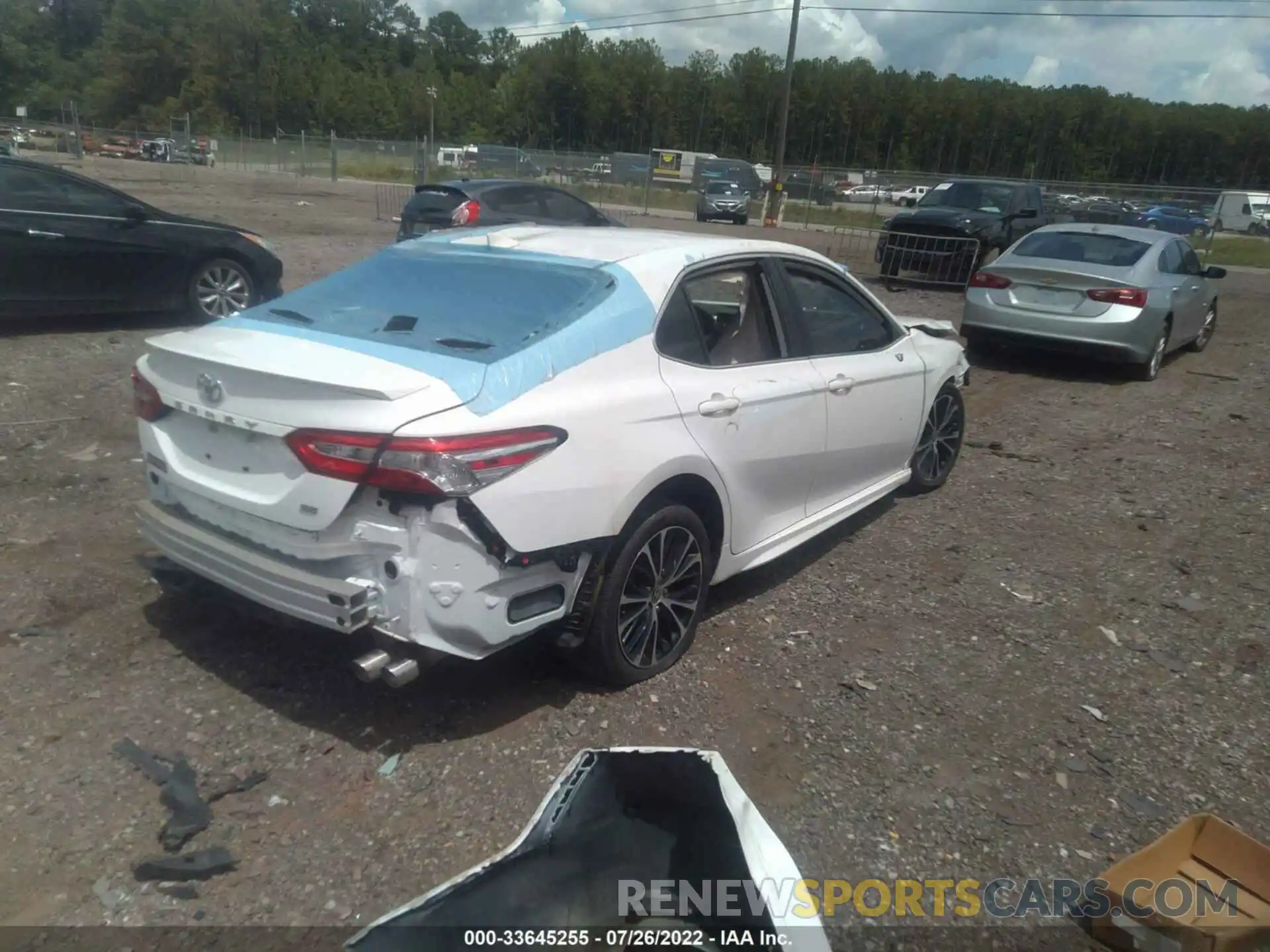 4 Photograph of a damaged car 4T1G11AK3LU963744 TOYOTA CAMRY 2020