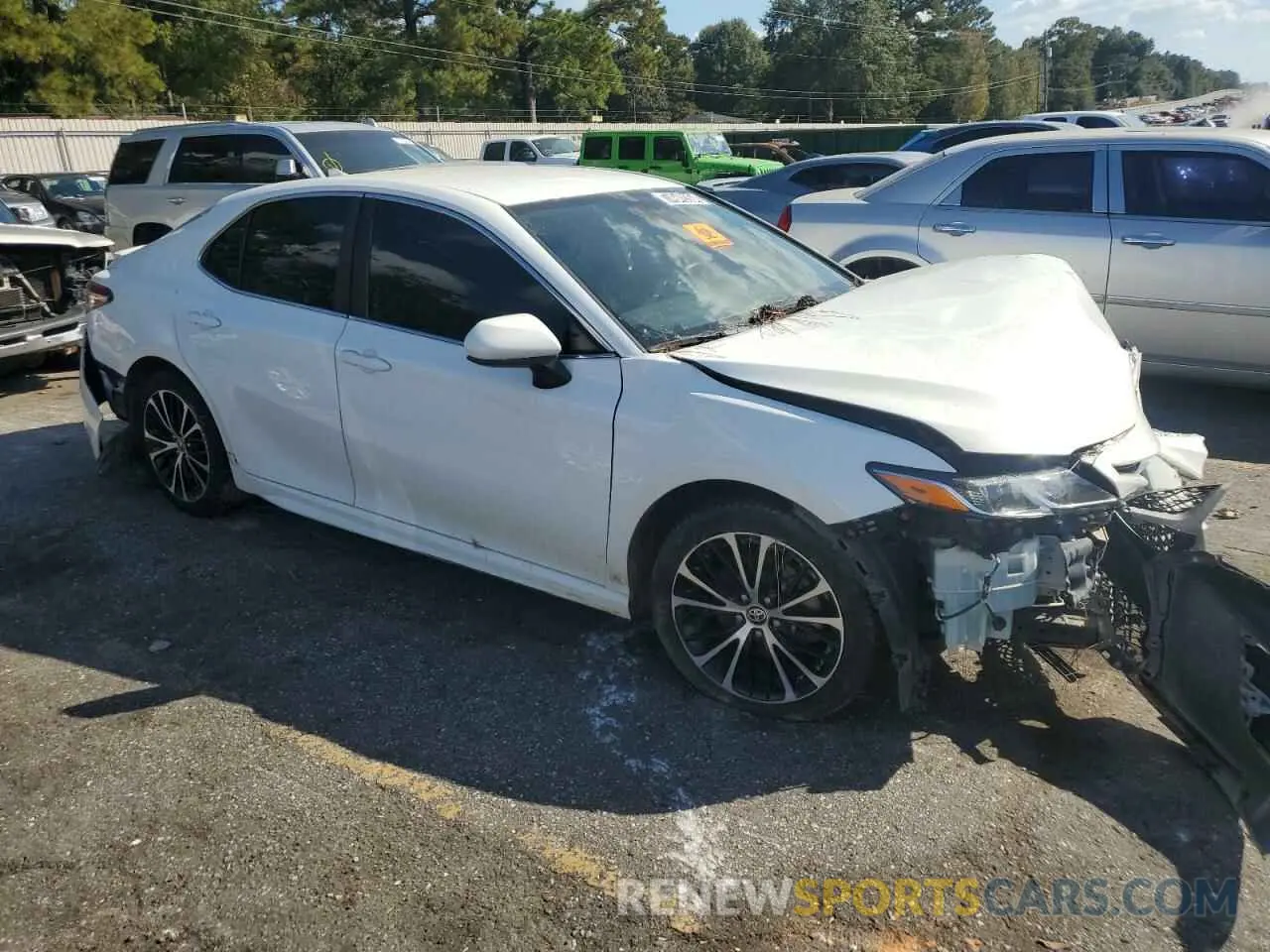 4 Photograph of a damaged car 4T1G11AK3LU966191 TOYOTA CAMRY 2020