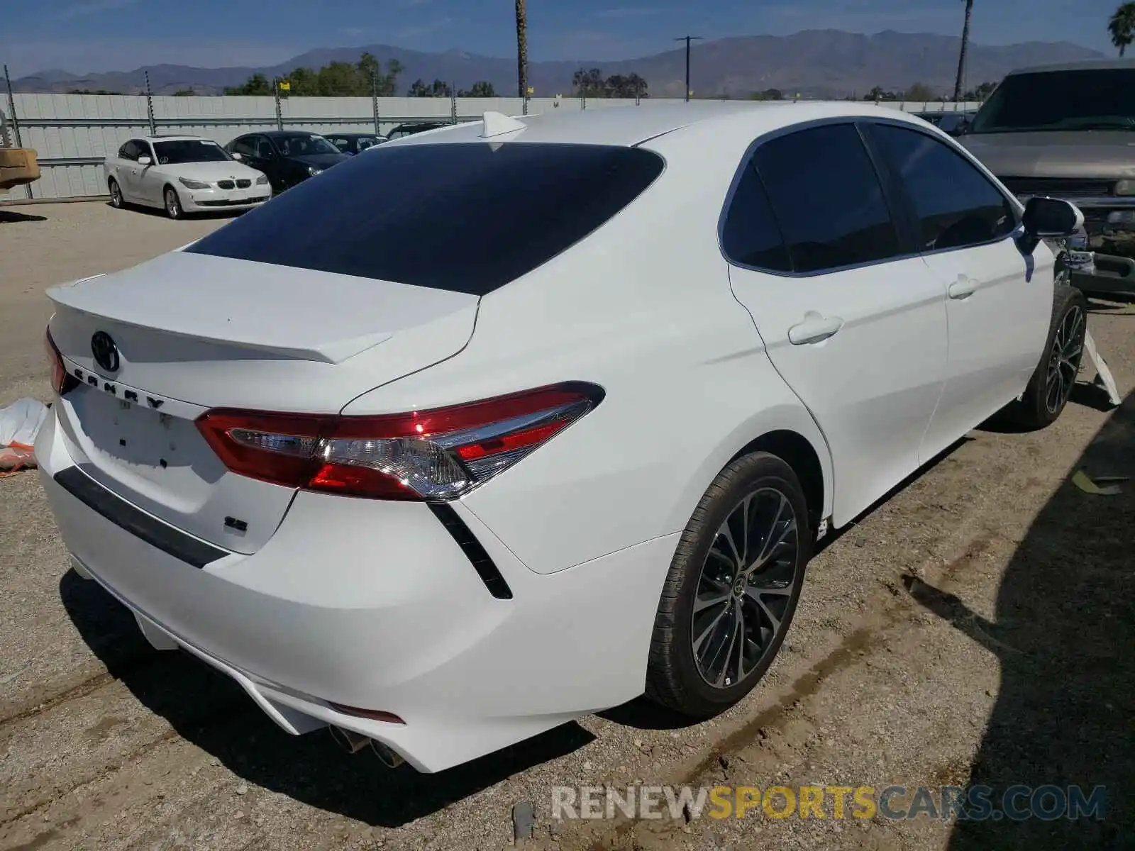 4 Photograph of a damaged car 4T1G11AK3LU968037 TOYOTA CAMRY 2020