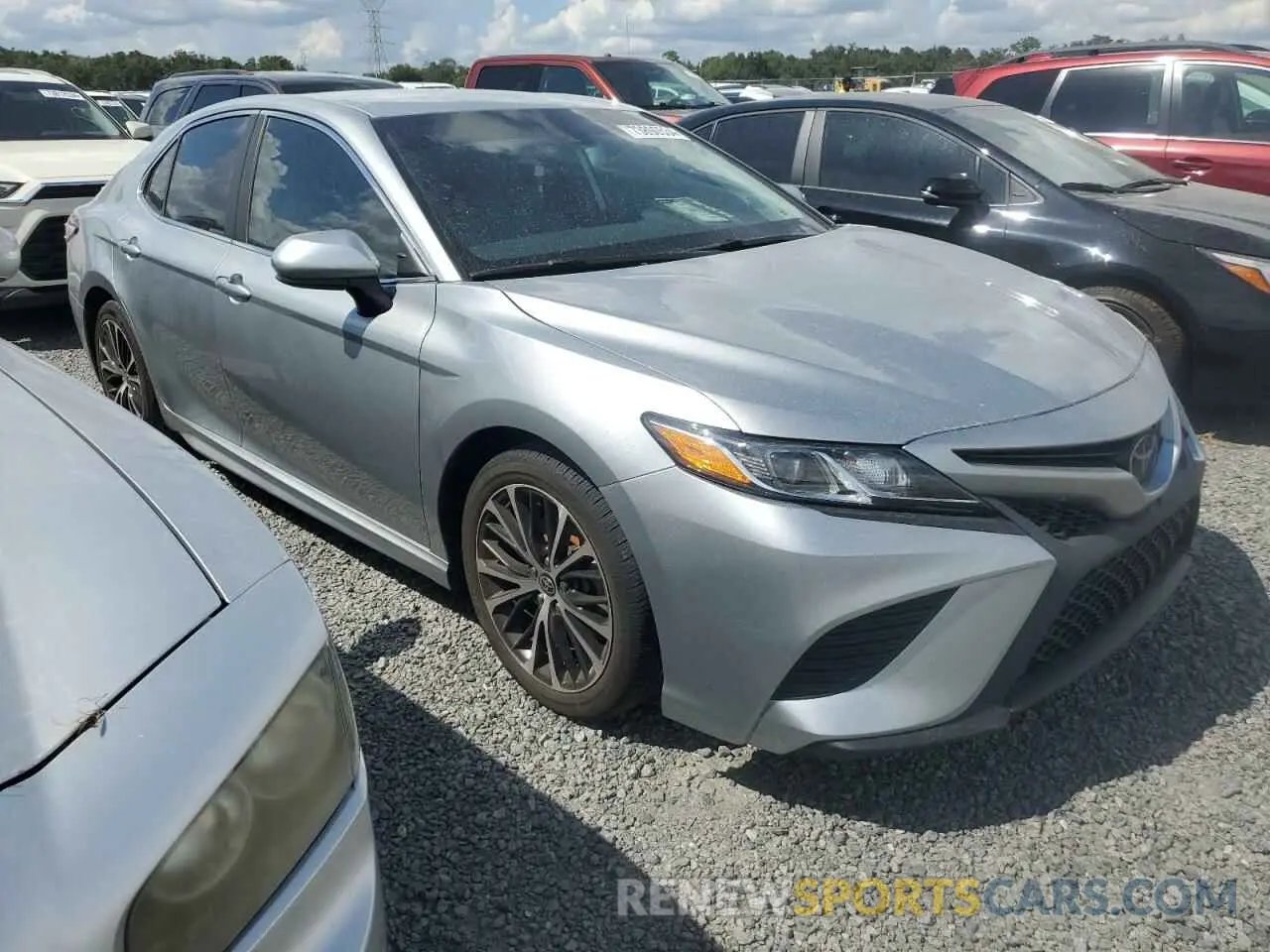 4 Photograph of a damaged car 4T1G11AK3LU988708 TOYOTA CAMRY 2020