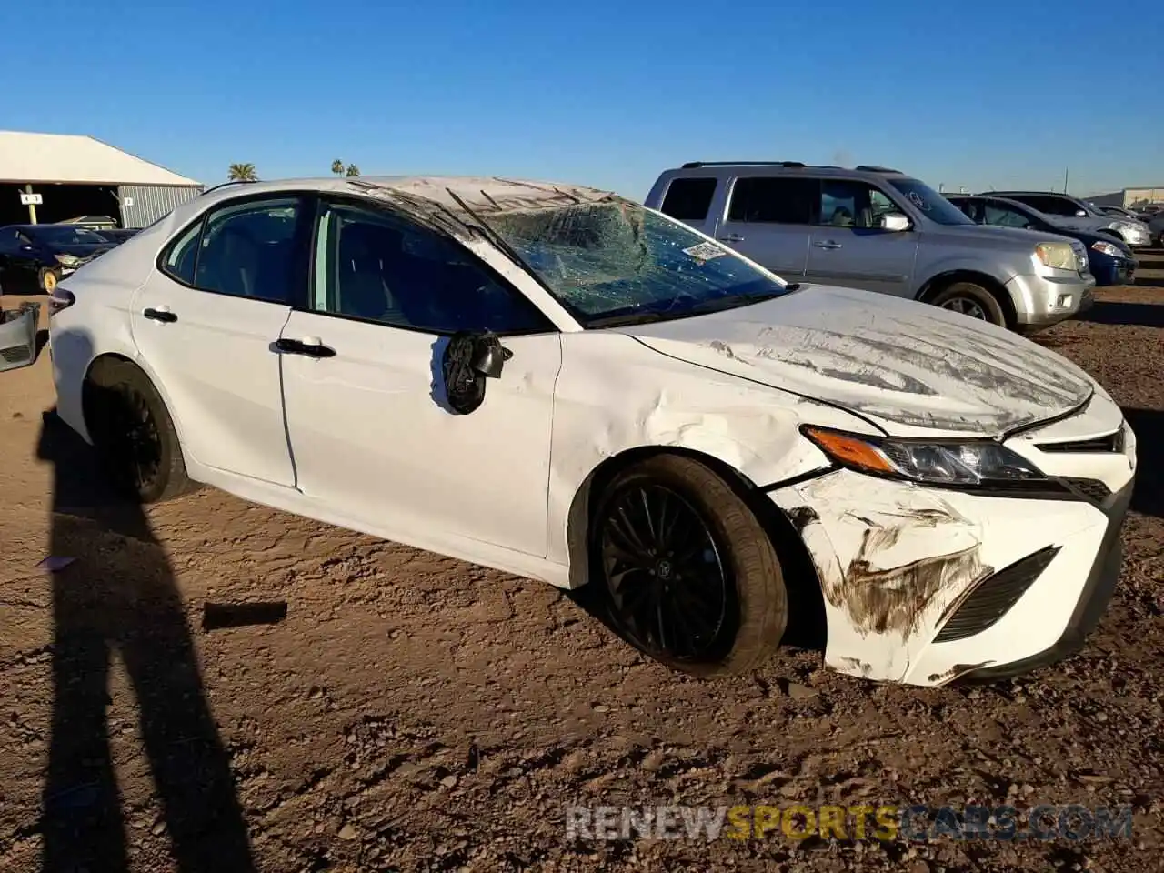 4 Photograph of a damaged car 4T1G11AK4LU402176 TOYOTA CAMRY 2020