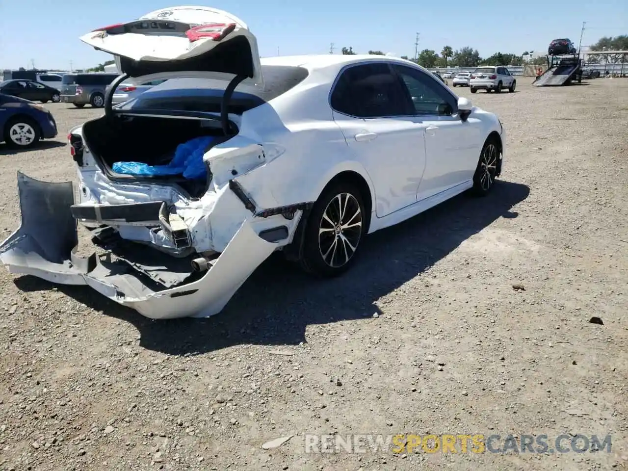 4 Photograph of a damaged car 4T1G11AK4LU945821 TOYOTA CAMRY 2020