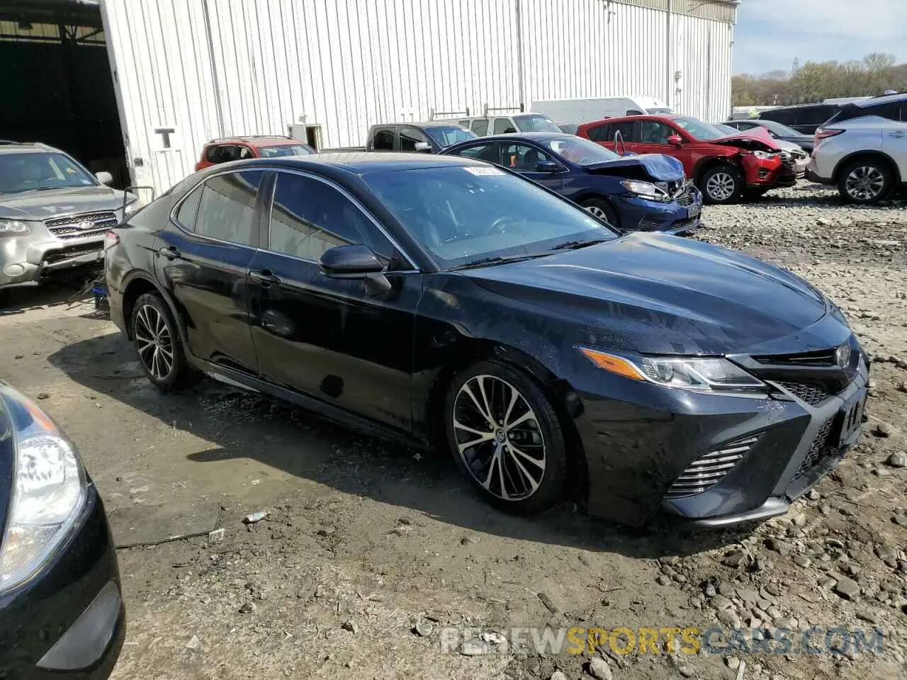 4 Photograph of a damaged car 4T1G11AK5LU352713 TOYOTA CAMRY 2020