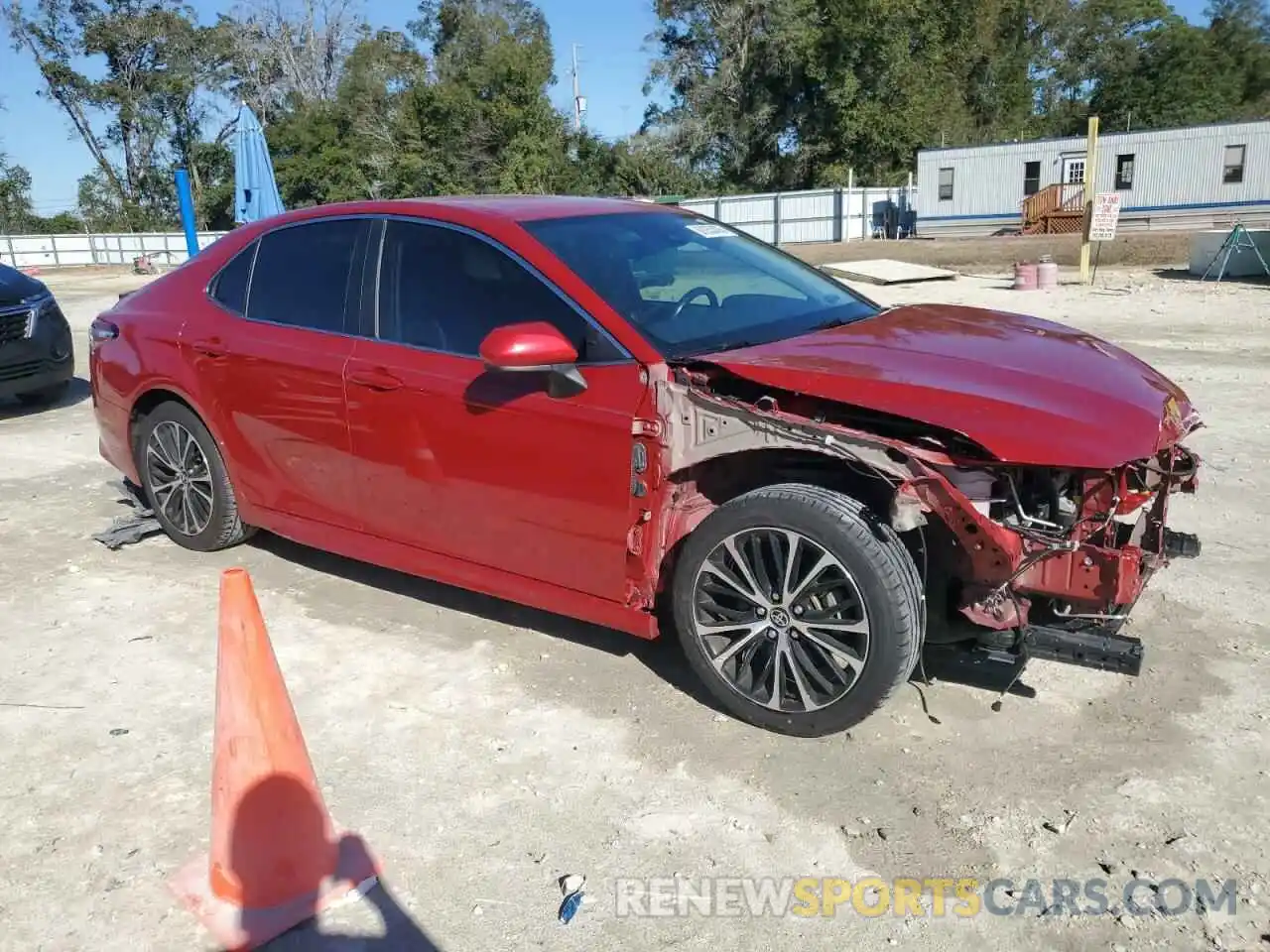 4 Photograph of a damaged car 4T1G11AK5LU375067 TOYOTA CAMRY 2020