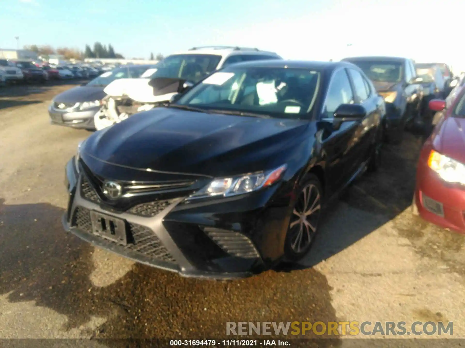 2 Photograph of a damaged car 4T1G11AK5LU871275 TOYOTA CAMRY 2020