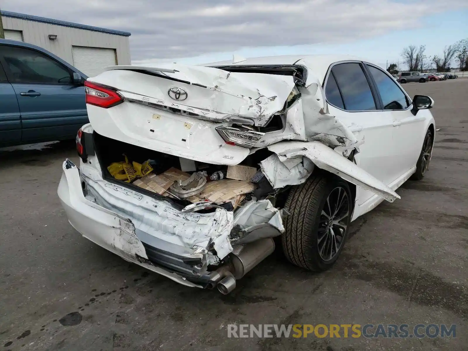 4 Photograph of a damaged car 4T1G11AK5LU984451 TOYOTA CAMRY 2020