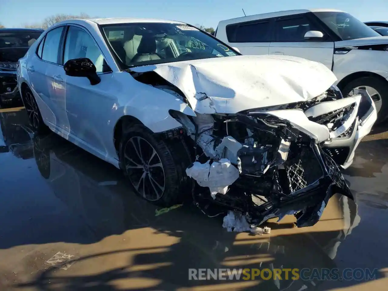 4 Photograph of a damaged car 4T1G11AK6LU358696 TOYOTA CAMRY 2020