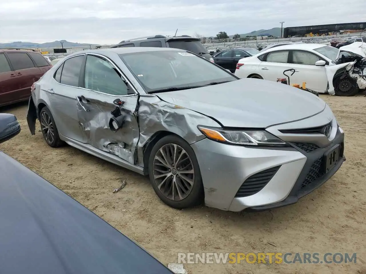4 Photograph of a damaged car 4T1G11AK6LU882057 TOYOTA CAMRY 2020
