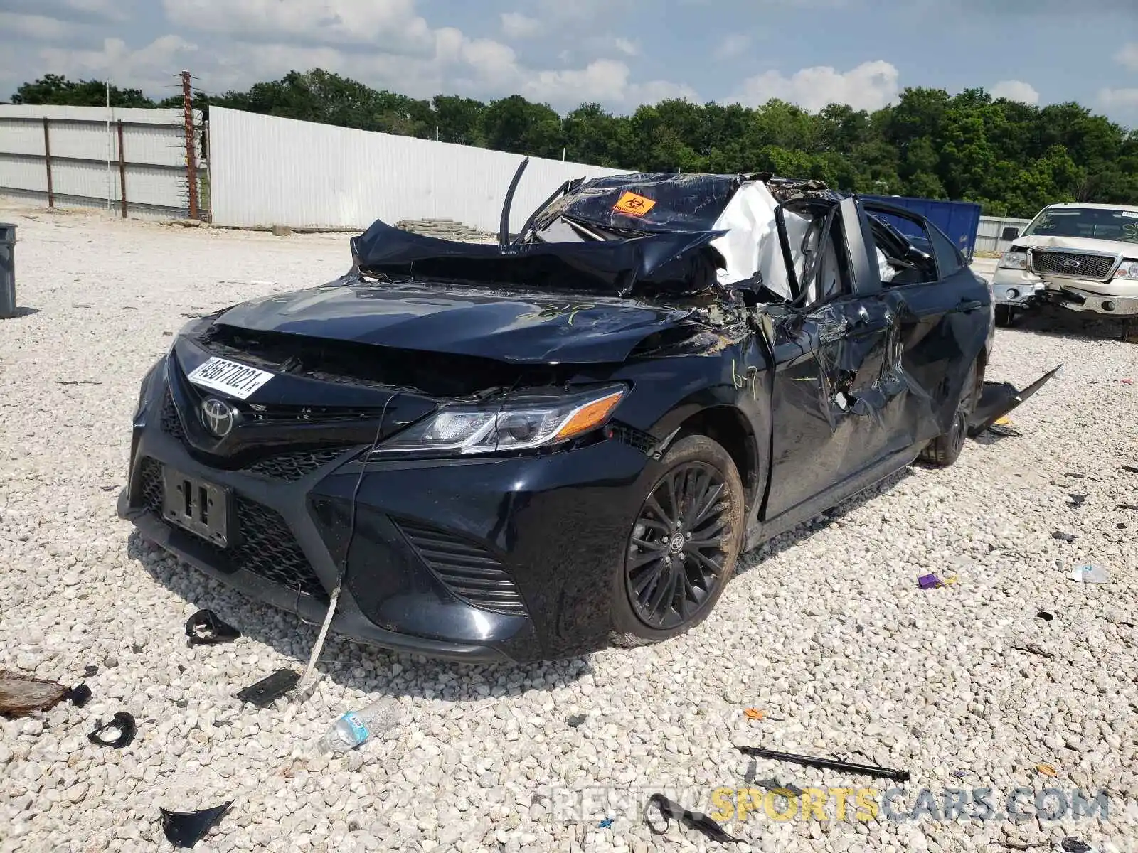 2 Photograph of a damaged car 4T1G11AK7LU310981 TOYOTA CAMRY 2020