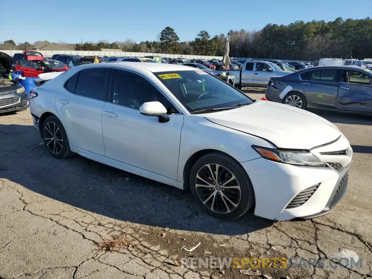 4 Photograph of a damaged car 4T1G11AK7LU864943 TOYOTA CAMRY 2020