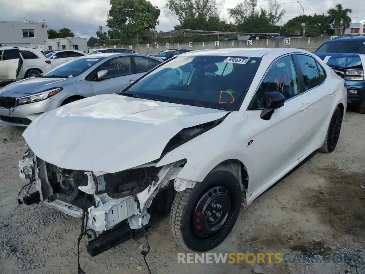 2 Photograph of a damaged car 4T1G11AK7LU954268 TOYOTA CAMRY 2020