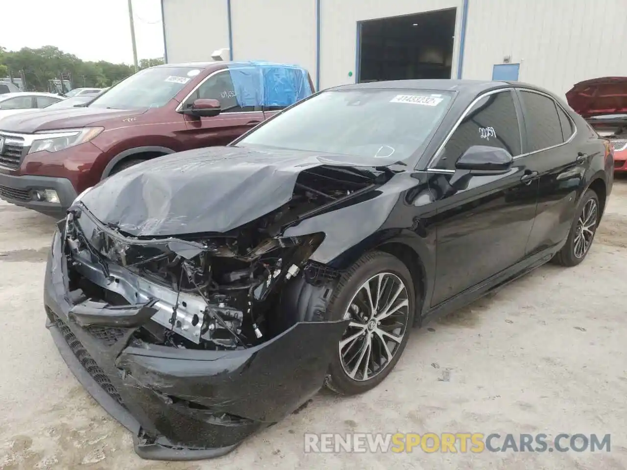 2 Photograph of a damaged car 4T1G11AK8LU324355 TOYOTA CAMRY 2020