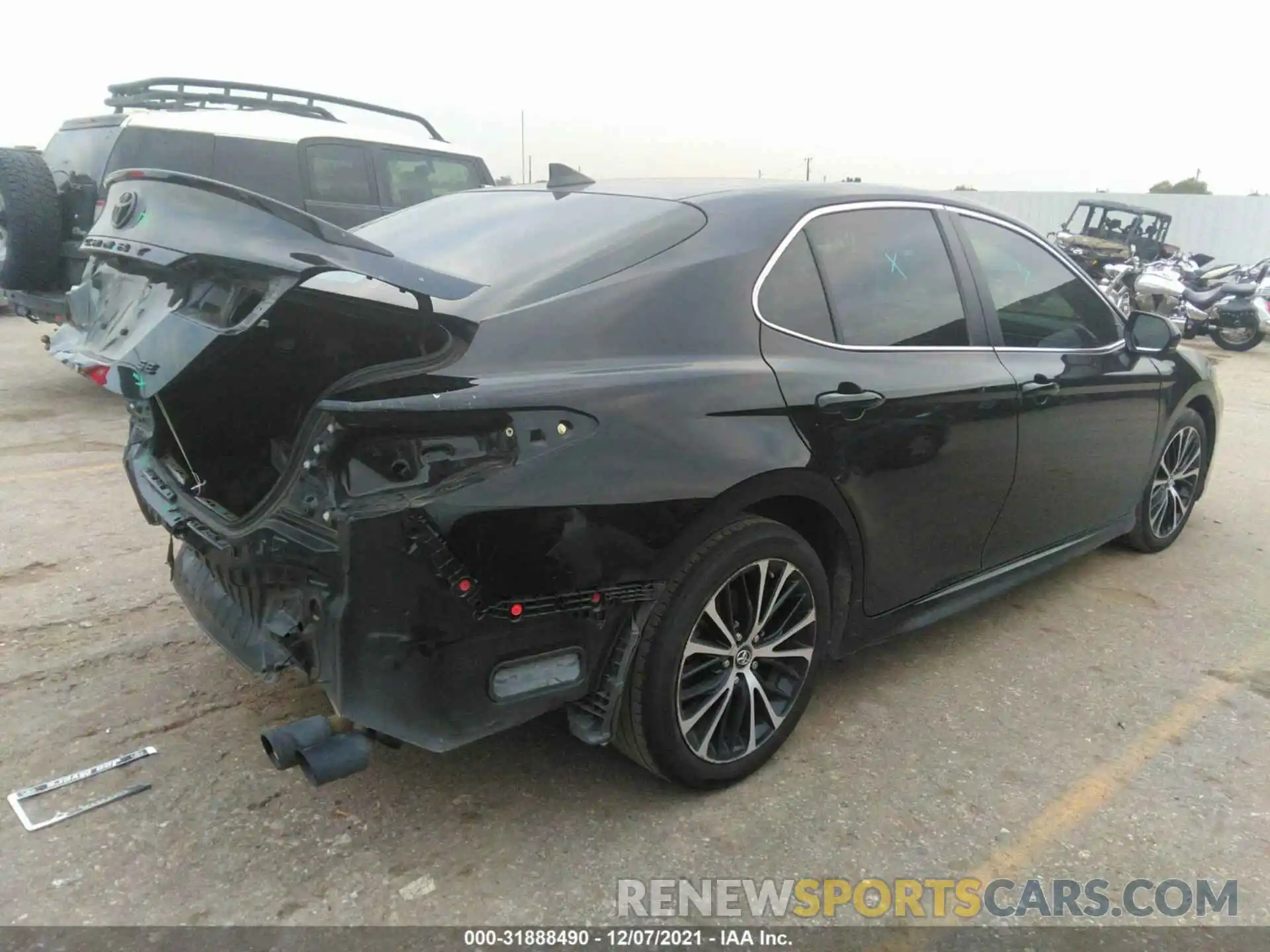 4 Photograph of a damaged car 4T1G11AK9LU321223 TOYOTA CAMRY 2020