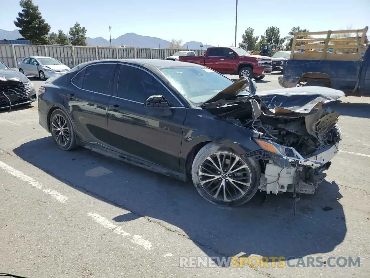 4 Photograph of a damaged car 4T1G11AK9LU340337 TOYOTA CAMRY 2020