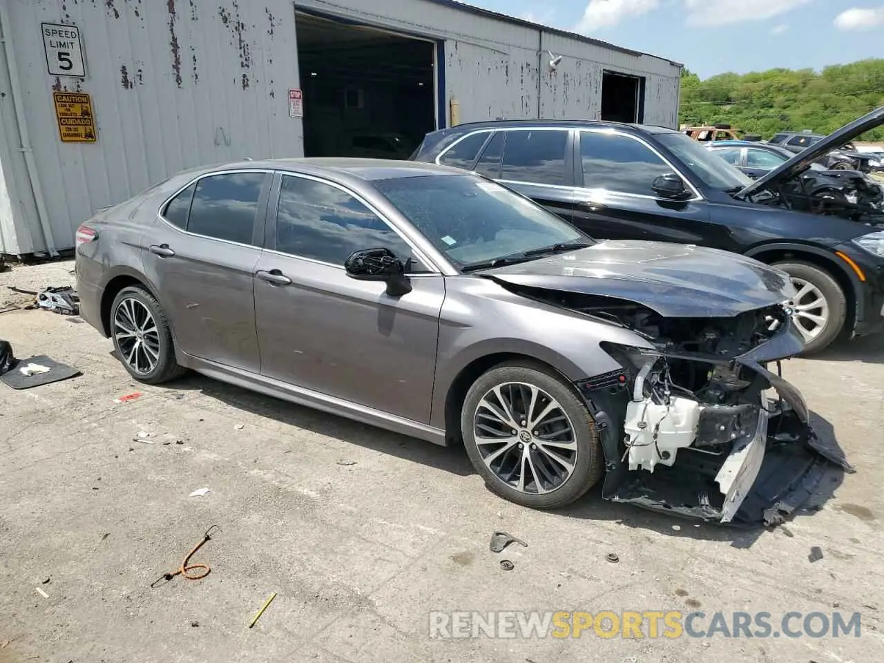 4 Photograph of a damaged car 4T1G11AK9LU362970 TOYOTA CAMRY 2020