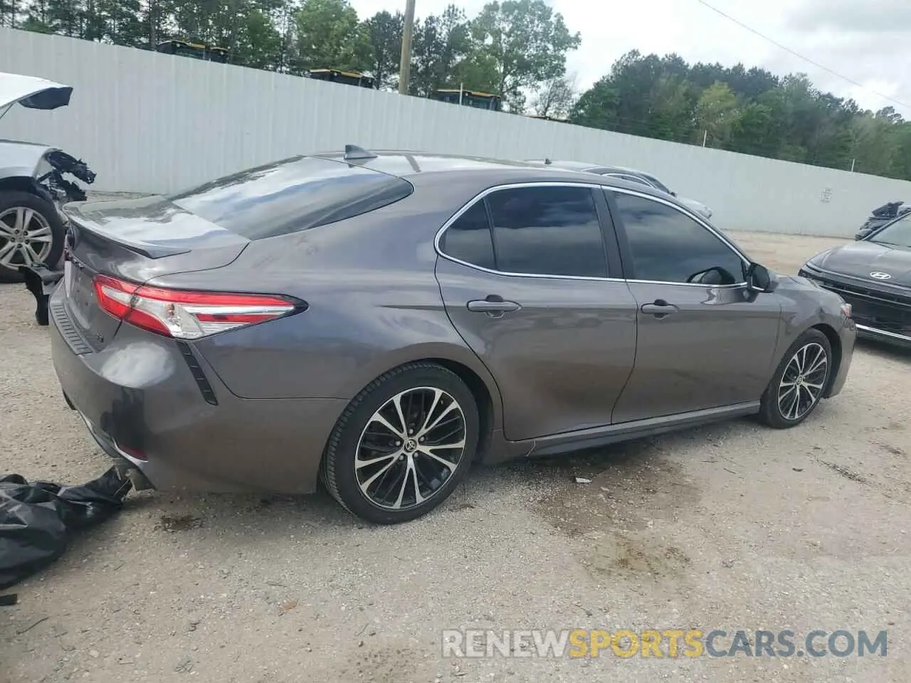 3 Photograph of a damaged car 4T1G11AK9LU374052 TOYOTA CAMRY 2020