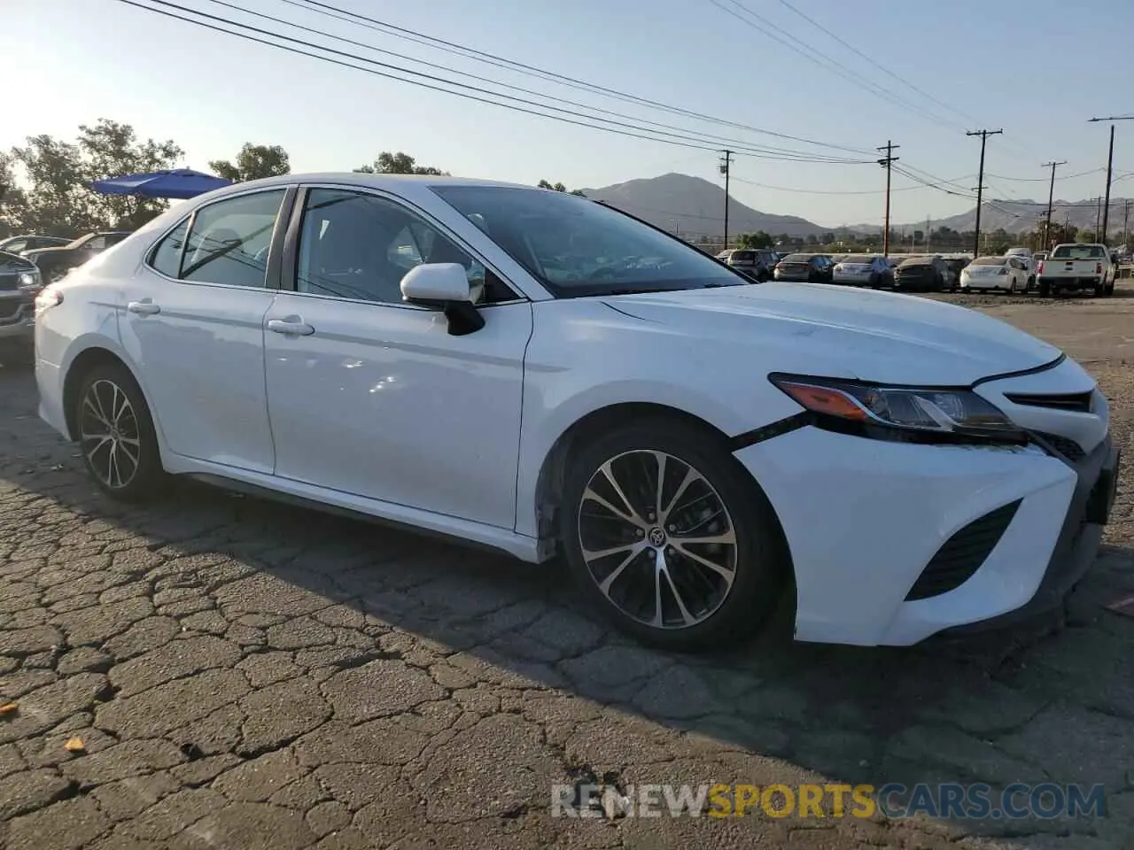 4 Photograph of a damaged car 4T1G11AK9LU375332 TOYOTA CAMRY 2020