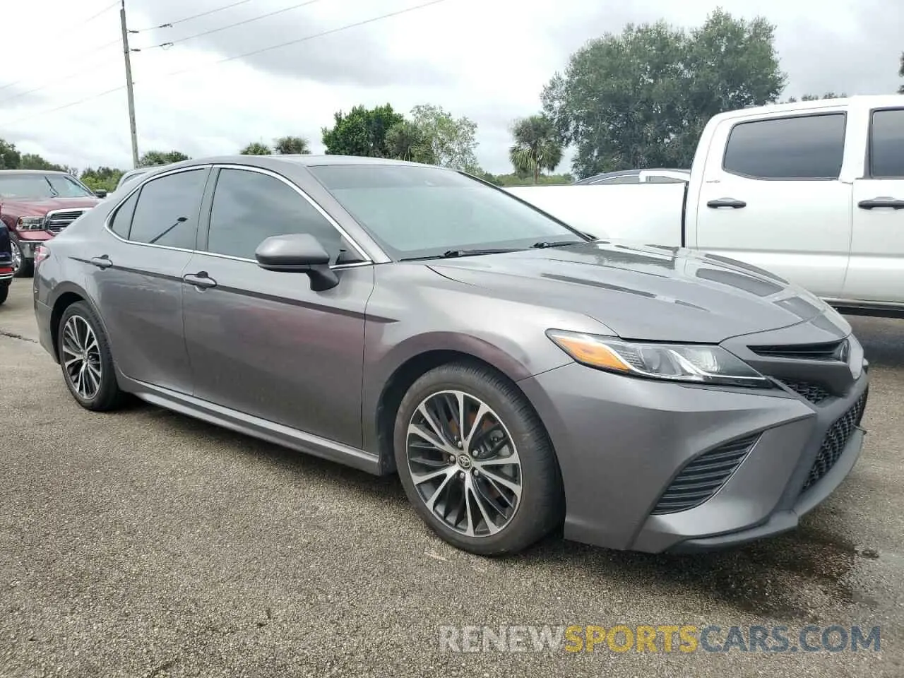 4 Photograph of a damaged car 4T1G11AK9LU384404 TOYOTA CAMRY 2020