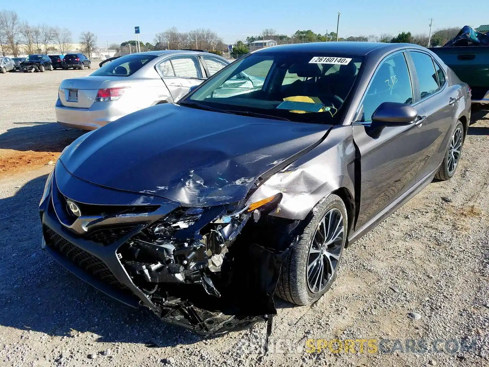 2 Photograph of a damaged car 4T1G11AK9LU869867 TOYOTA CAMRY 2020