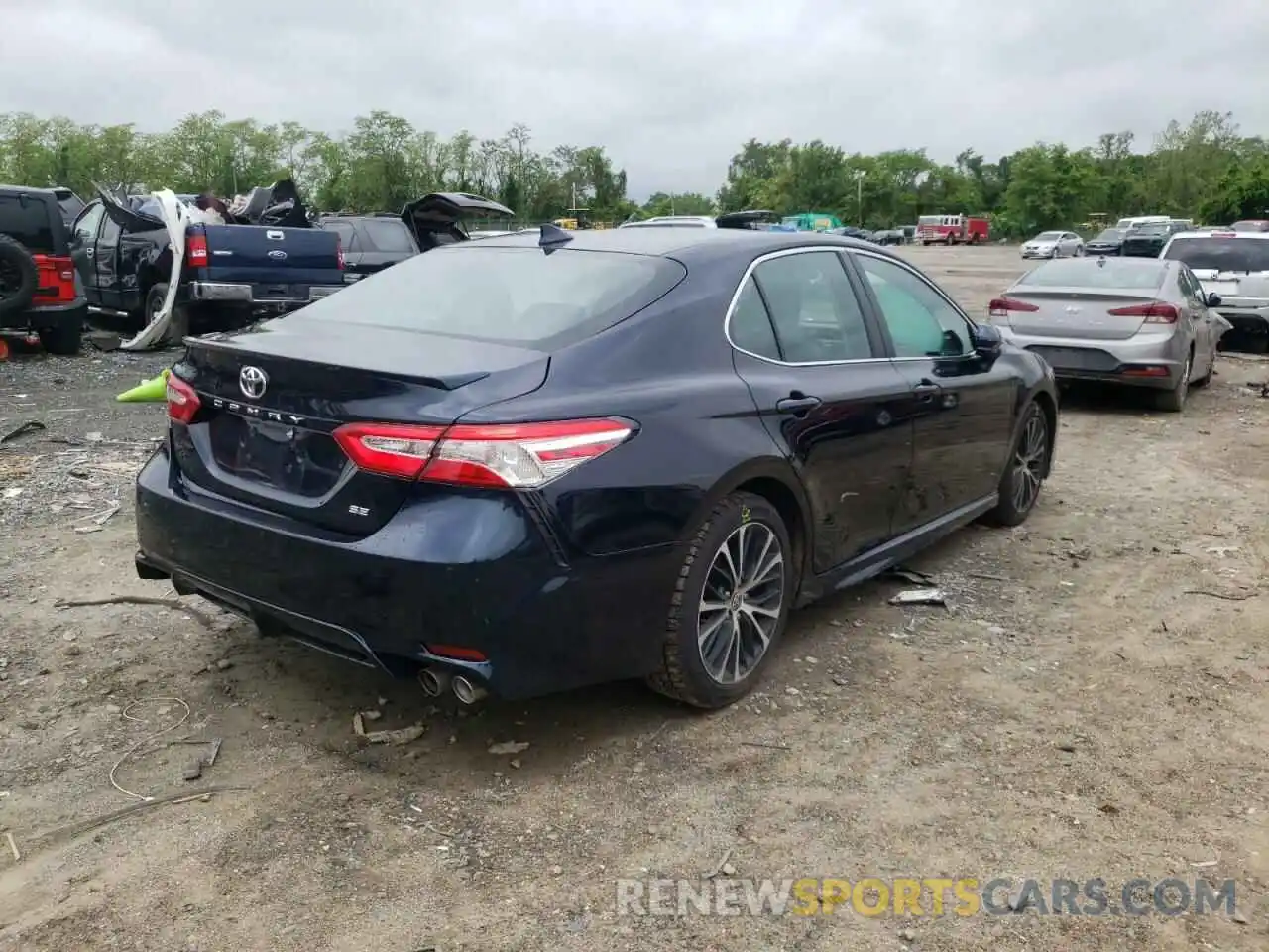 4 Photograph of a damaged car 4T1G11AK9LU968124 TOYOTA CAMRY 2020