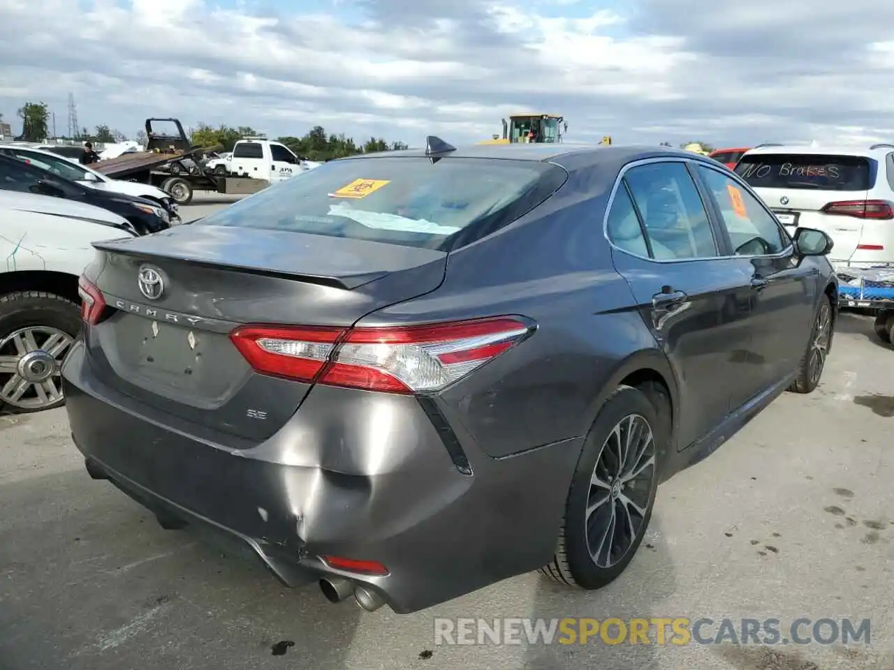 4 Photograph of a damaged car 4T1G11AKXLU306987 TOYOTA CAMRY 2020