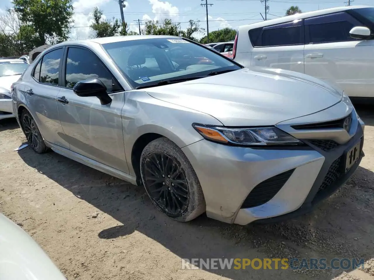 4 Photograph of a damaged car 4T1G11AKXLU315589 TOYOTA CAMRY 2020