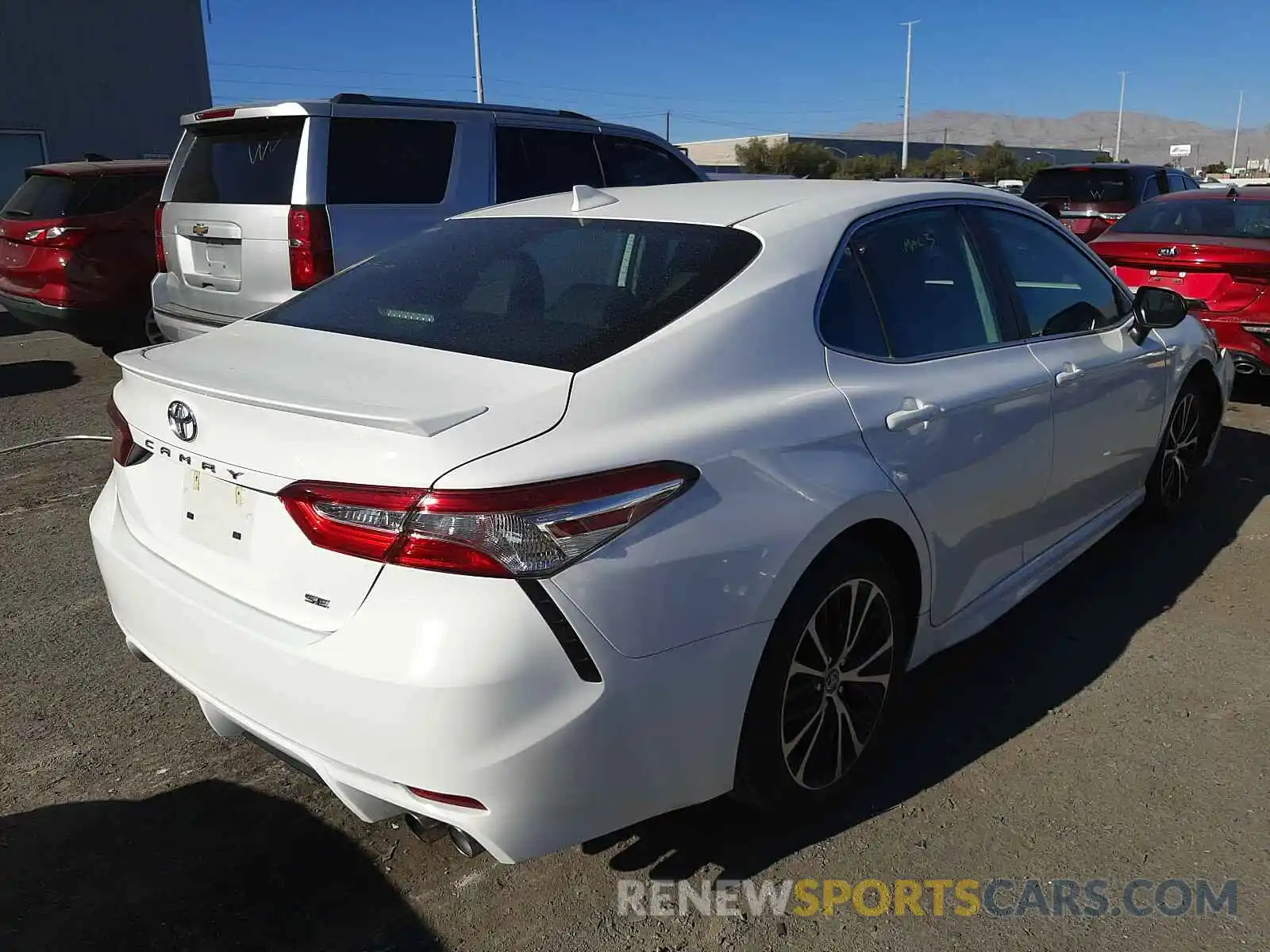 4 Photograph of a damaged car 4T1G11AKXLU927470 TOYOTA CAMRY 2020