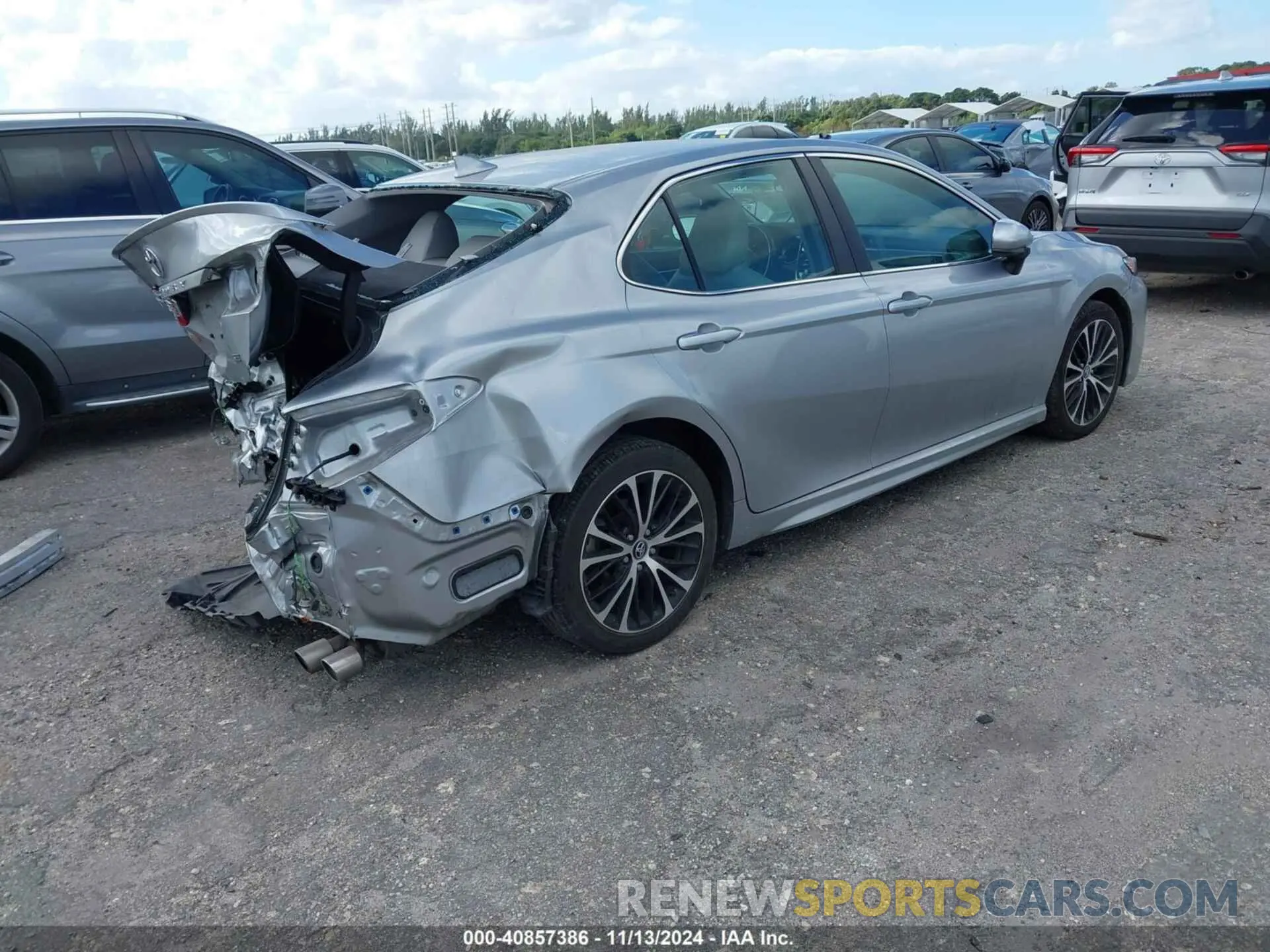 4 Photograph of a damaged car 4T1G11AKXLU937058 TOYOTA CAMRY 2020
