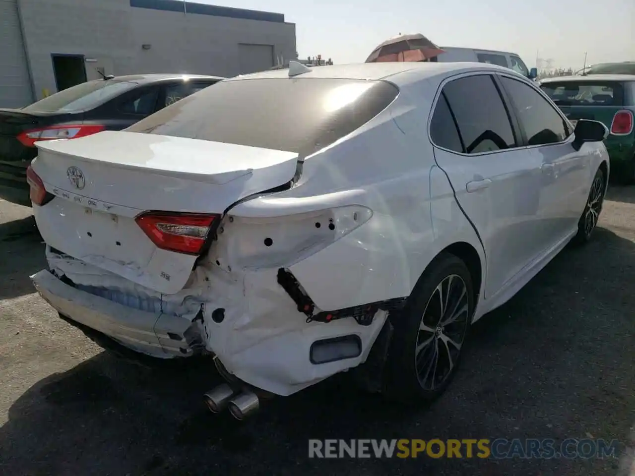 4 Photograph of a damaged car 4T1G11AKXLU943748 TOYOTA CAMRY 2020