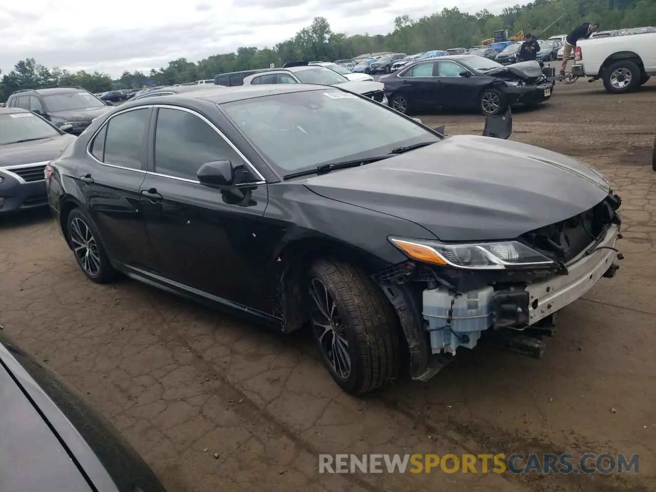 4 Photograph of a damaged car 4T1G11AKXLU957262 TOYOTA CAMRY 2020
