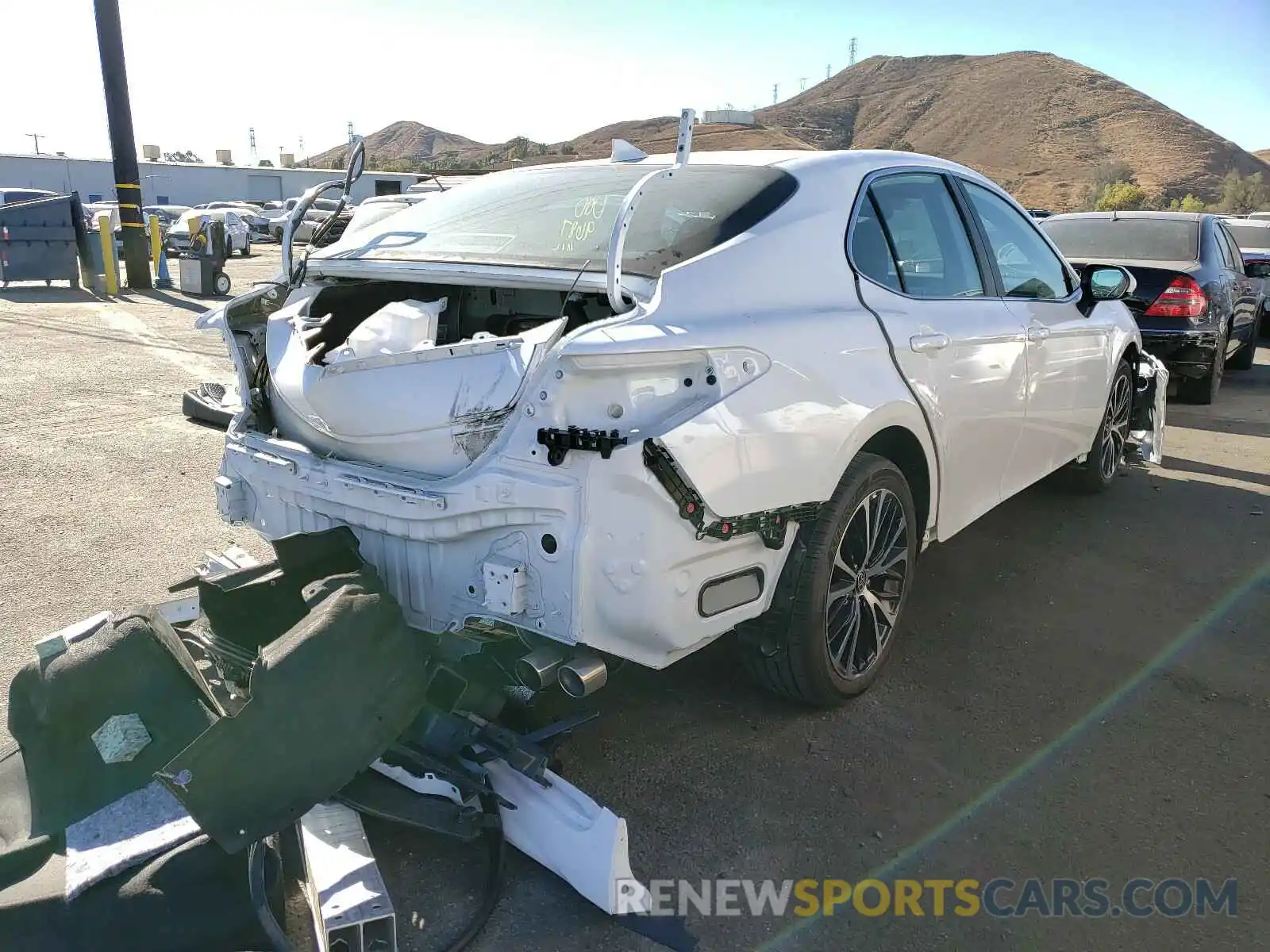 4 Photograph of a damaged car 4T1G11AKXLU966415 TOYOTA CAMRY 2020