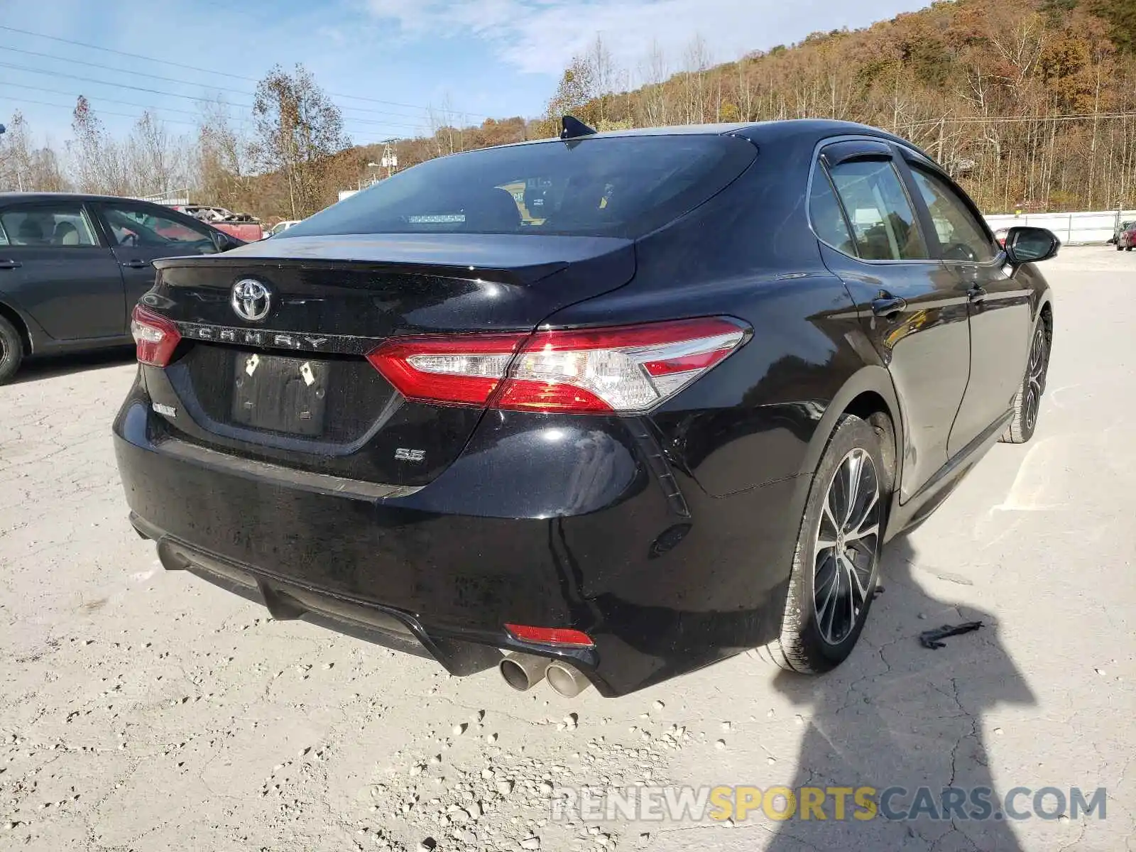 4 Photograph of a damaged car 4T1G11AKXLU971923 TOYOTA CAMRY 2020