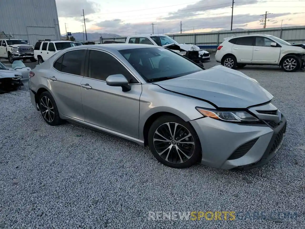 4 Photograph of a damaged car 4T1G11BK0LU009967 TOYOTA CAMRY 2020