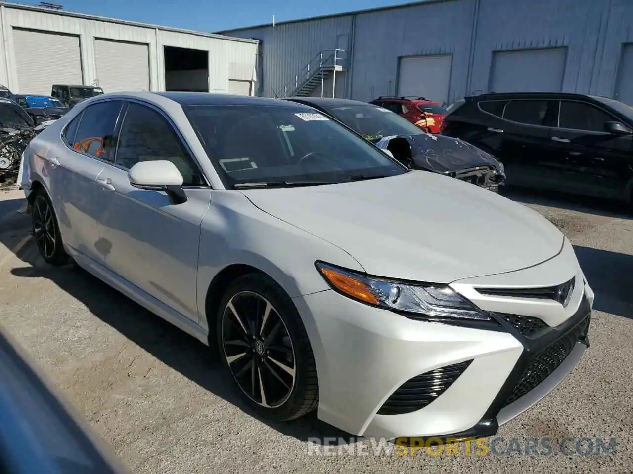 4 Photograph of a damaged car 4T1K61AK9LU928279 TOYOTA CAMRY 2020