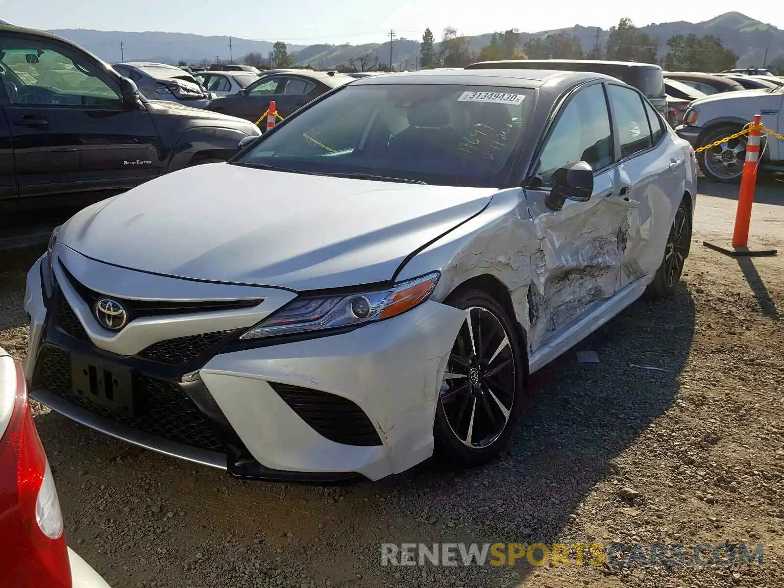 2 Photograph of a damaged car 4T1K61AKXLU330671 TOYOTA CAMRY 2020